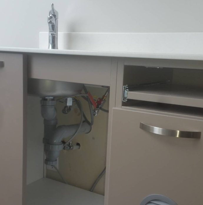 Under-sink drain and P-trap work by Integrity Plumbing in Ottawa